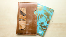 Load image into Gallery viewer, Caramel Italian Leather and Hand Marbled Field Notes or Passport Sleeve
